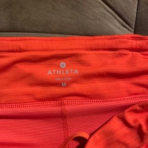 Athleta orange tennis skirt